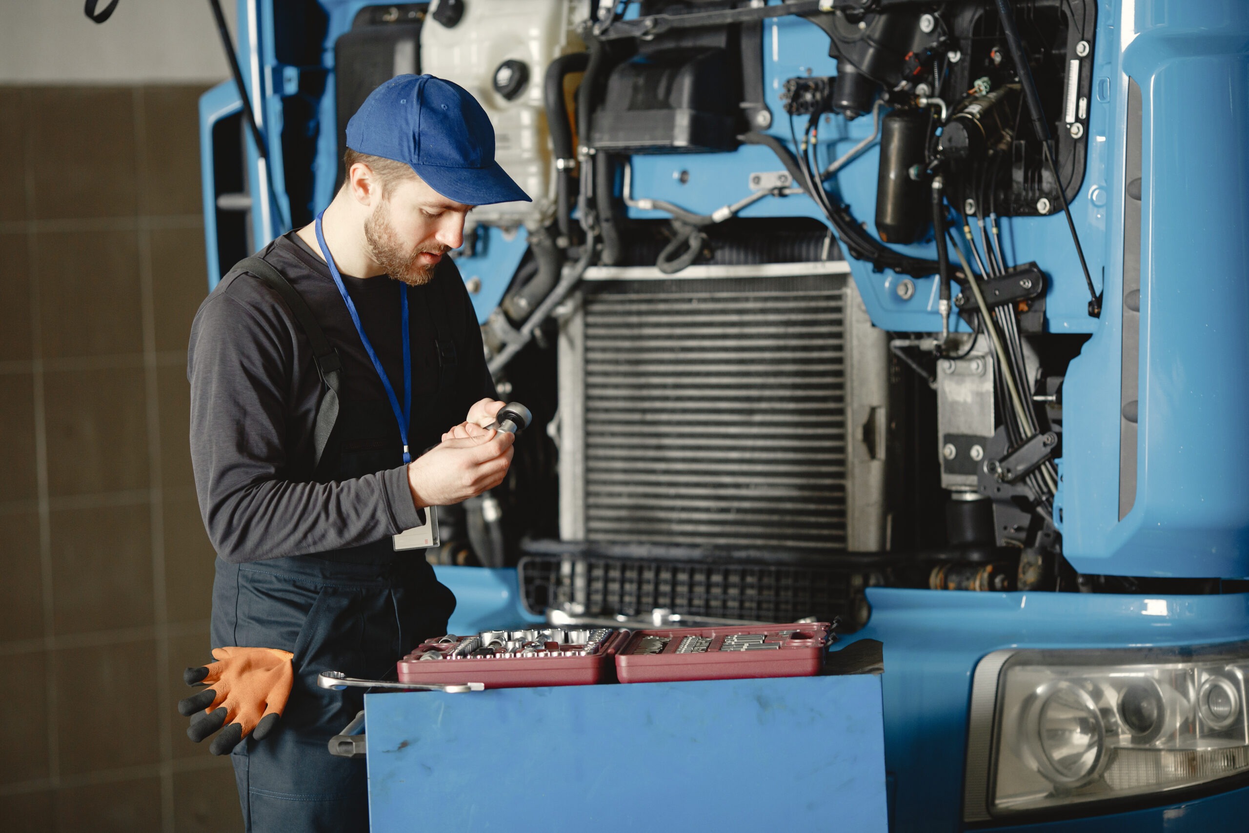 Heavy Vehicle Maintenance Isleworth – mechanic repairing truck in West London